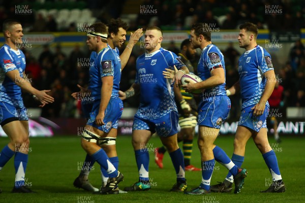081218 Northampton Saints v Dragons - European Rugby Challenge Cup - Adam Warren of The Dragons is congratulated by team mates