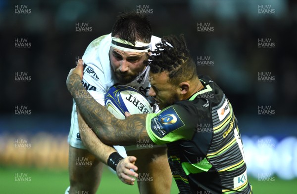 091217 - Northampton Saints v Ospreys - European Rugby Champions Cup - Scott Baldwin of Ospreys is tackled by Courtney Lawes of Northampton