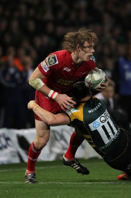 18.11.11 - Northampton Saints v Scarlets - Heineken Cup Scarlets' Liam Williams is stopped by Saints' Vasily Artymyev 