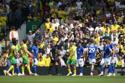 030525 - Norwich City v Cardiff City - Sky Bet Championship - Calum Chambers of Cardiff City (12) is shown a red card by referee Will Finnie