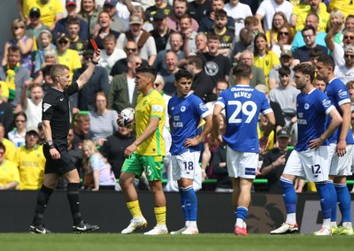 030525 - Norwich City v Cardiff City - Sky Bet Championship - Calum Chambers of Cardiff City (12) is shown a red card by referee Will Finnie