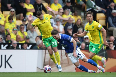030525 - Norwich City v Cardiff City - Sky Bet Championship - Cian Ashford of Cardiff City is fouled by Kenny McLean of Norwich City