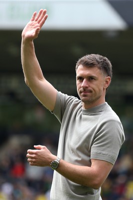 030525 - Norwich City v Cardiff City - Sky Bet Championship - Cardiff City Interim First Team Manager Aaron Ramsey applauds the fans at the final whistle 