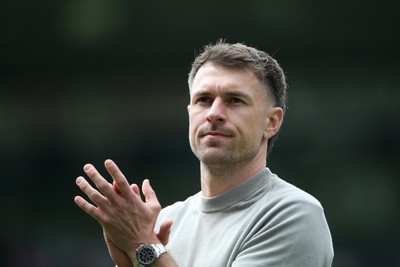030525 - Norwich City v Cardiff City - Sky Bet Championship - Cardiff City Interim First Team Manager Aaron Ramsey applauds the fans at the final whistle 