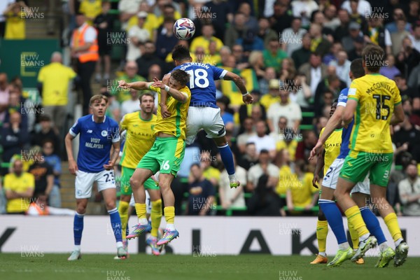 030525 - Norwich City v Cardiff City - Sky Bet Championship - Alex Robertson of Cardiff City and Jacob Wright of Norwich City challenge for a header