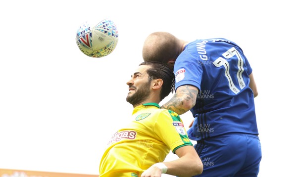 140418 - Norwich City v Cardiff City, Sky Bet Championship - Mario Vrancic of Norwich City and Aron Gunnarsson of Cardiff City compete for the ball