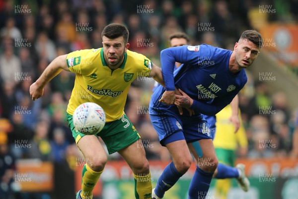 140418 - Norwich City v Cardiff City, Sky Bet Championship - Gary Madine of Cardiff City and Grant Hanley of Norwich City look to win the ball