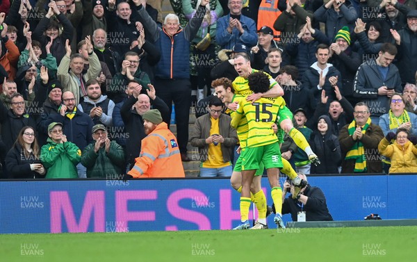 170224 - Norwich City v Cardiff City - Sky Bet Championship - Josh Sargent of Norwich City celebrates with Ashley Barnes of Norwich City and Sam McCallum of Norwich City after scoring  their side's 3rd goal to make it 3-1