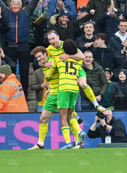 170224 - Norwich City v Cardiff City - Sky Bet Championship - Josh Sargent of Norwich City celebrates with Ashley Barnes of Norwich City and Sam McCallum of Norwich City after scoring  their side's 3rd goal to make it 3-1
