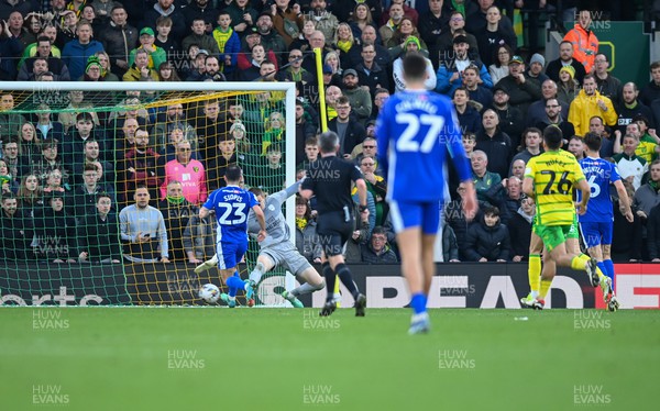 170224 - Norwich City v Cardiff City - Sky Bet Championship - Christian Fassnacht of Norwich City puts the ball past Ethan Horvath goalkeeper of Cardiff City to score their side's 4th goal to make it 4-1