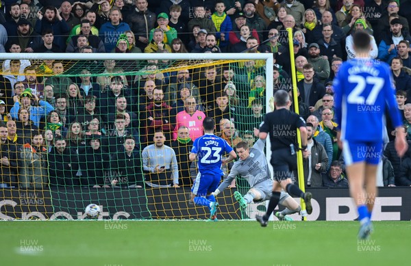 170224 - Norwich City v Cardiff City - Sky Bet Championship - Christian Fassnacht of Norwich City puts the ball past Ethan Horvath goalkeeper of Cardiff City to score their side's 4th goal to make it 4-1