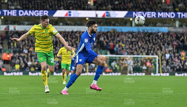 170224 - Norwich City v Cardiff City - Sky Bet Championship - Kion Etete of Cardiff City and Kenny McLean of Norwich City