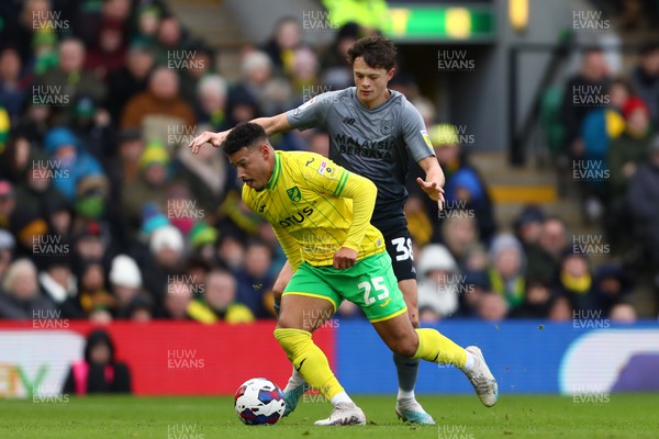250223 - Norwich City v Cardiff City - Sky Bet Championship - Onel Hernandez of Norwich City and Perry Ng of Cardiff City