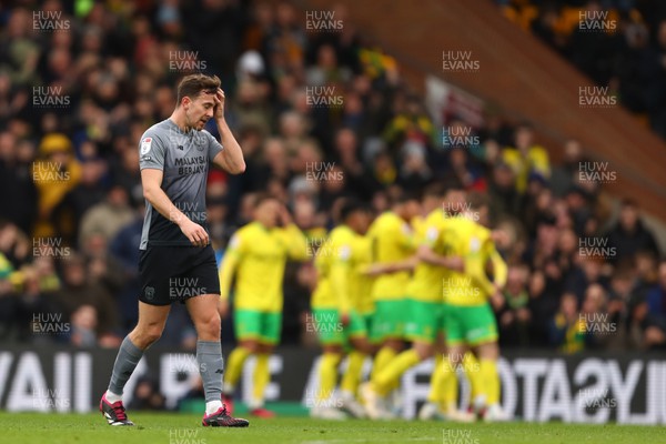 250223 - Norwich City v Cardiff City - Sky Bet Championship - Ryan Wintle of Cardiff City is seen after Norwich City players celebrate the opening goal scored by Gabriel Sara of Norwich City