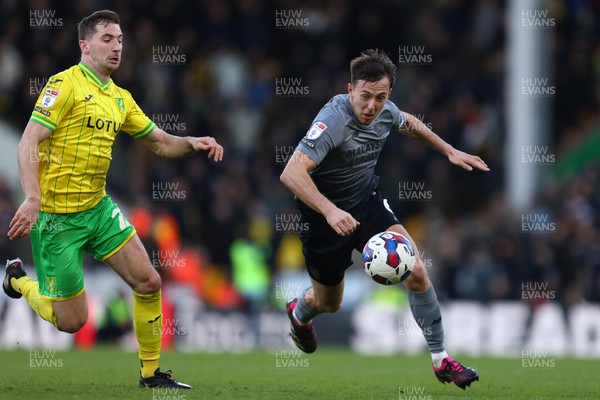 250223 - Norwich City v Cardiff City - Sky Bet Championship - Ryan Wintle of Cardiff City and Kenny McLean of Norwich City
