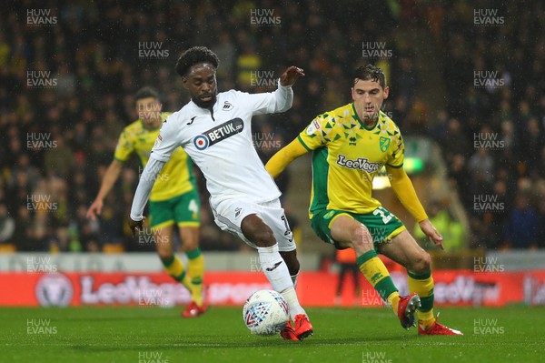 080319 - Norwich City v Swansea City - Sky Bet Championship -  Nathan Dyer of Swansea City and Kenny McLean of Norwich City 