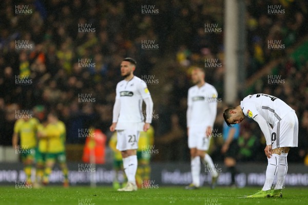 080319 - Norwich City v Swansea City - Sky Bet Championship -  Swansea City players look on after the opening goal from Emi Buendia of Norwich City 