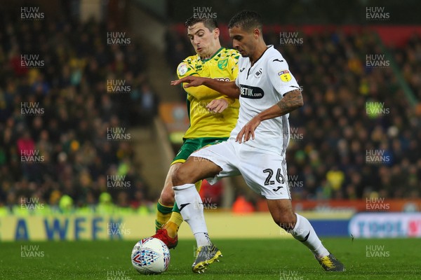 080319 - Norwich City v Swansea City - Sky Bet Championship -  Kyle Naughton of Swansea City battles with Kenny McLean of Norwich City