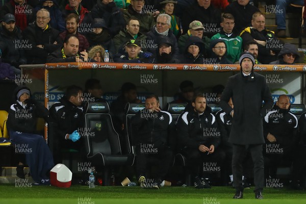 080319 - Norwich City v Swansea City - Sky Bet Championship -  Manager of Swansea City, Graham Potter watches on from the bench 