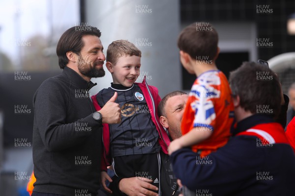 220423 - Norwich City v Swansea City - Sky Bet Championship - Manager Russell Martin meets some young fans after the win against Norwich City