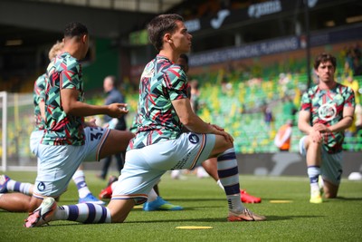 250426 - Norwich City v Swansea City - Sky Bet Championship - Swansea players warm up before kick off
