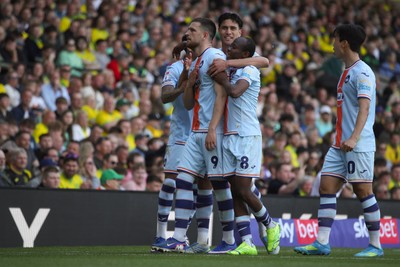 250426 - Norwich City v Swansea City - Sky Bet Championship - Zan Vipotnik of Swansea City and his team mates celebrate 