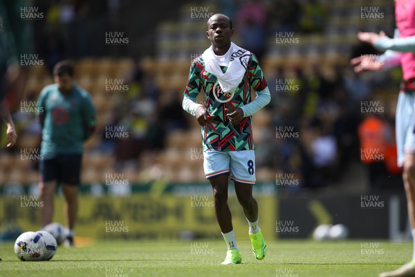 250426 - Norwich City v Swansea City - Sky Bet Championship - Malick Yalcouye of Swansea City warms up before kick off