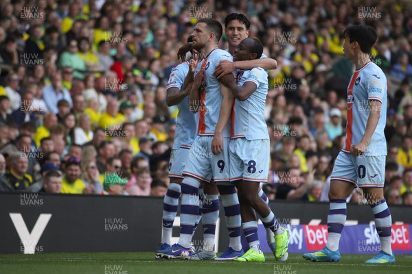 250426 - Norwich City v Swansea City - Sky Bet Championship - Zan Vipotnik of Swansea City and his team mates celebrate 