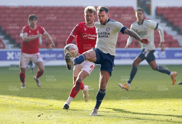 090121 - Nottingham Forest v Cardiff City - FA Cup Third Round - Joe Ralls of Cardiff traps the ball away from Joe Worrall of Nottingham Forest