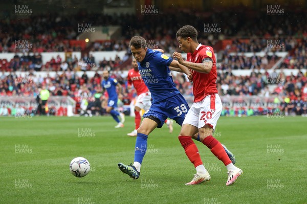 120921 - Nottingham Forest v Cardiff City, Sky Bet Championship - Perry Ng of Cardiff City gets past Brennan Johnson of Nottingham Forest