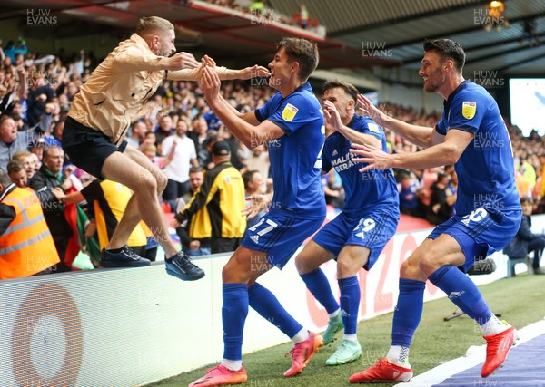 120921 - Nottingham Forest v Cardiff City, Sky Bet Championship - A Cardiff jumps in to join Rubin Colwill of Cardiff City as he celebrates after he score the second goal