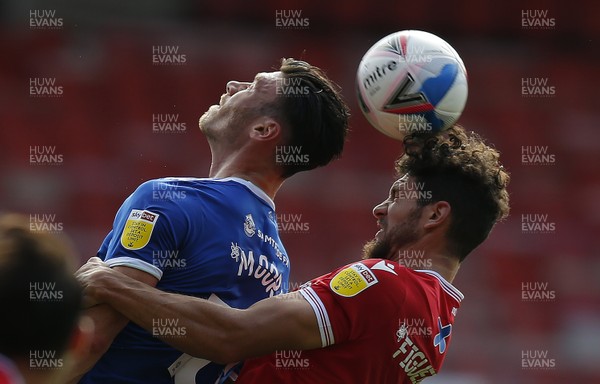190920 - Nottingham Forest v Cardiff City - Sky Bet Championship - Kieffer Moore of Cardiff and Tobias Figueiredo of Nottingham Forest