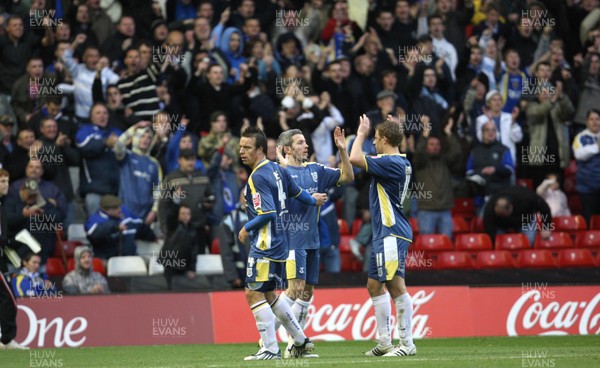 25.10.08 ... Nottingham Forest v Cardiff City, Coca Cola Championship -  Cardiff's Gavin Rae, Kevin McNaughton and Paul parry celebrate the win infront of the traveling fans 