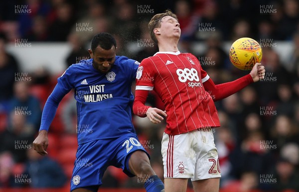 261117 - Nottingham Forest v Cardiff - SkyBet Championship - Loic Damour of Cardiff City and Kieran Dowell of Nottingham Forest go up for the ball