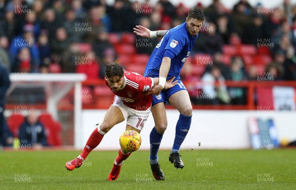 261117 - Nottingham Forest v Cardiff - SkyBet Championship - Matty Cash of Nottingham Forest is tackled by Greg Halford of Cardiff City