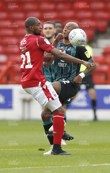 150720 - Nottingham Forest v Swansea - Sky Bet Championship - Andre Ayew of Swansea and Samba Sow of Nottingham Forest causing injury to Swansea player