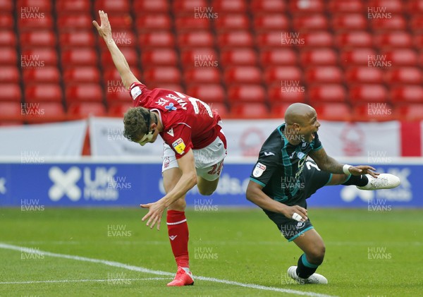 150720 - Nottingham Forest v Swansea - Sky Bet Championship - Andre Ayew of Swansea goes down in the box by Ryan Yates of Nottingham Forest for a penalty