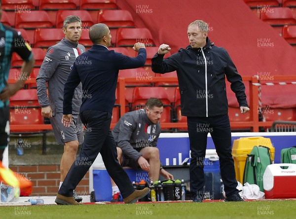 150720 - Nottingham Forest v Swansea - Sky Bet Championship - Manager Steve Cooper of Swansea and Manager Sabri Lamouchi of Nottingham Forest touch fists at the end of the match