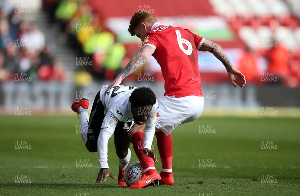 300319 - Nottingham Forest v Swansea City - SkyBet Championship - Nathan Dyer of Swansea City is tackled by Jack Colback of Nottingham Forest