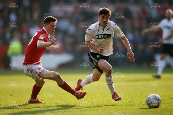300319 - Nottingham Forest v Swansea City - SkyBet Championship - Daniel James of Swansea City is challenged by Joe Lolley of Nottingham Forest