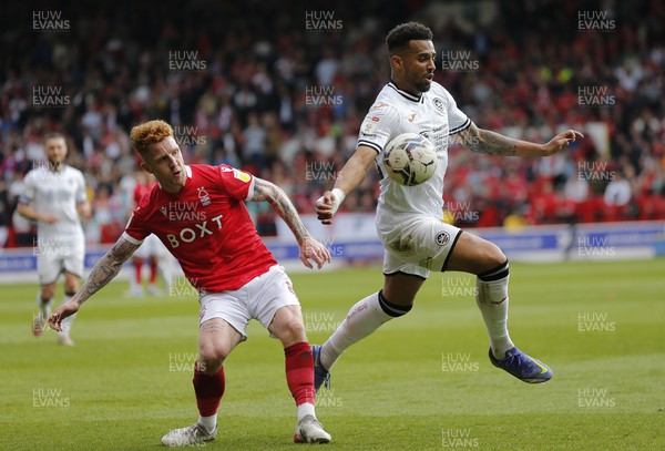 300422 - Nottingham Forest v Swansea City - Sky Bet Championship - Cyrus Christie of Swansea and Jack Colback of Nottingham Forest