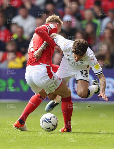 300422 - Nottingham Forest v Swansea City - Sky Bet Championship - Jamie Paterson of Swansea and Joe Worrall of Nottingham Forest