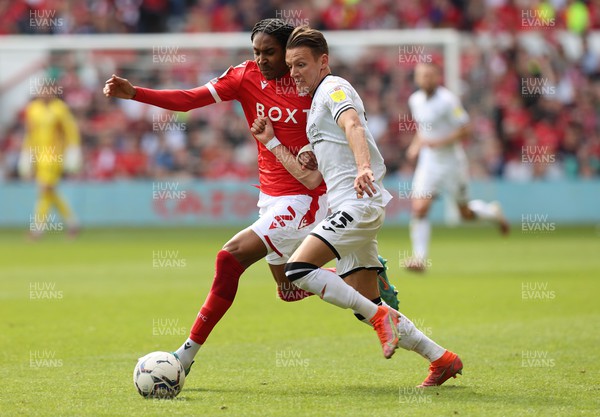 300422 - Nottingham Forest v Swansea City - Sky Bet Championship - Hannes Wolf of Swansea and Djed Spence of Nottingham Forest