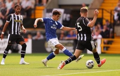 260725  Notts County v Cardiff City, Pre-season Friendly - Alex Robertson of Cardiff City looks to shoot past Matty Platt of Notts County