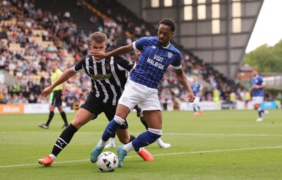 260725  Notts County v Cardiff City, Pre-season Friendly - Chris Willock of Cardiff City controls the ball holds off Matty Platt of Notts County