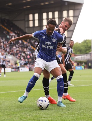 260725  Notts County v Cardiff City, Pre-season Friendly - Chris Willock of Cardiff City controls the ball holds off Matty Platt of Notts County
