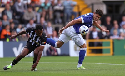 260725  Notts County v Cardiff City, Pre-season Friendly - Yousef Salech of Cardiff City and Jacob Bedeau of Notts County compete for the ball