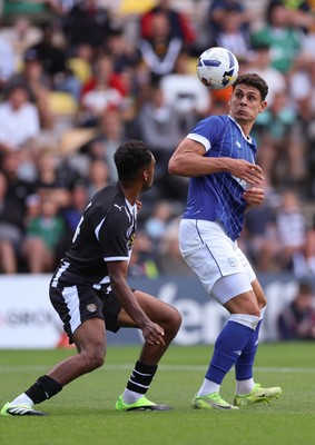 260725  Notts County v Cardiff City, Pre-season Friendly - Yousef Salech of Cardiff City and Jacob Bedeau of Notts County compete for the ball