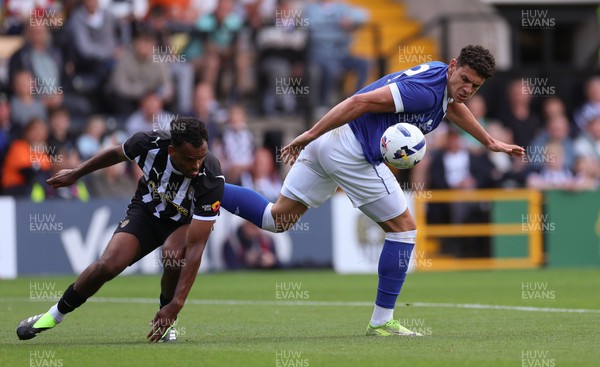 260725  Notts County v Cardiff City, Pre-season Friendly - Yousef Salech of Cardiff City and Jacob Bedeau of Notts County compete for the ball