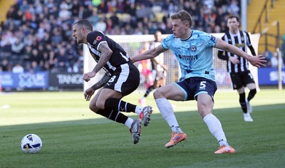060426 - Notts County v Newport County - Sky Bet League 2 - Sven Sprangler of Newport and Oliver Norburn of Notts County